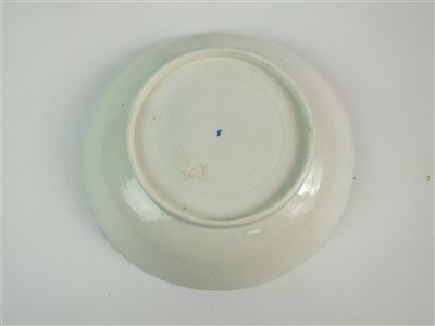 Lot 12 - A Caughley 'Waiting Chinaman' tea bowl and saucer