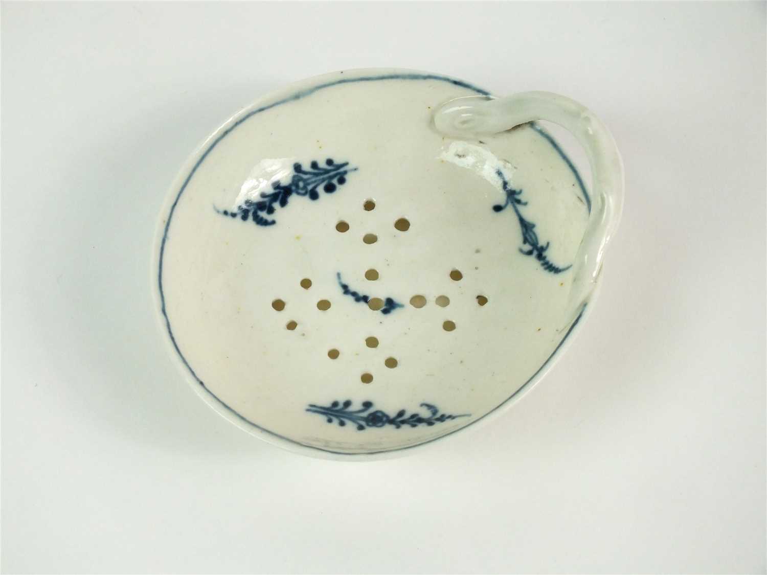 Lot 21 - A Caughley 'Locre Sprigs' porcelain egg drainer