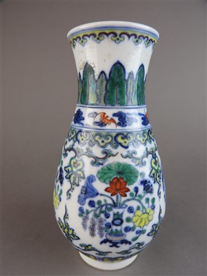 Lot 27 - A Chinese doucai porcelain vase of pear shape...