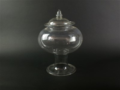 Lot 112 - An early 19th century glass leech jar and cover