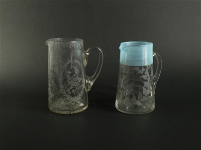 Lot 115 - Two English glass water jugs