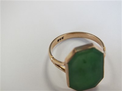 Lot 21 - Two jade rings and a lapis lazuli ring