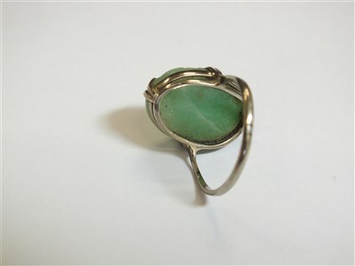 Lot 21 - Two jade rings and a lapis lazuli ring
