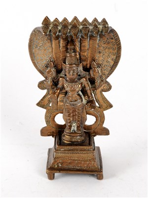 Lot 527 - A small Indian cast bronze altar figure in the form of Shiva