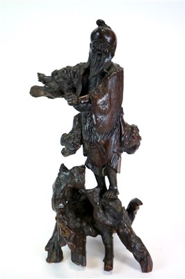 Lot 342 - A Japanese Meiji period rootwood carving of a standing sage