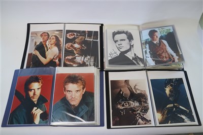 Lot 218 - FILM STILLS, including a folder of photographs...