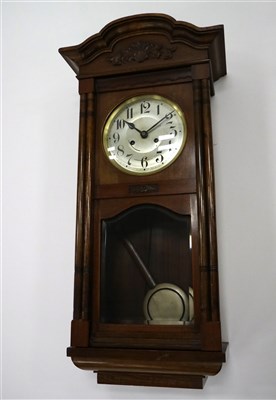 Lot 585 - An early 20th century walnut cased wall clock