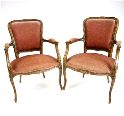 Lot 532 - A pair of early 20th century French upholstered armchairs