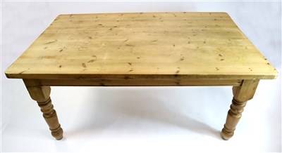 Lot 410 - A large pale pine farmhouse kitchen table