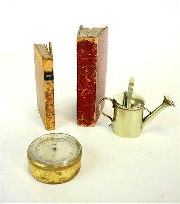 Lot 404 - A pocket compensated altimeter and a novelty miniature watering can