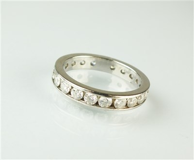 Lot 335 - An 18ct white gold diamond full eternity ring