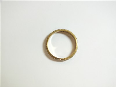 Lot 89 - A white stone set eternity ring
