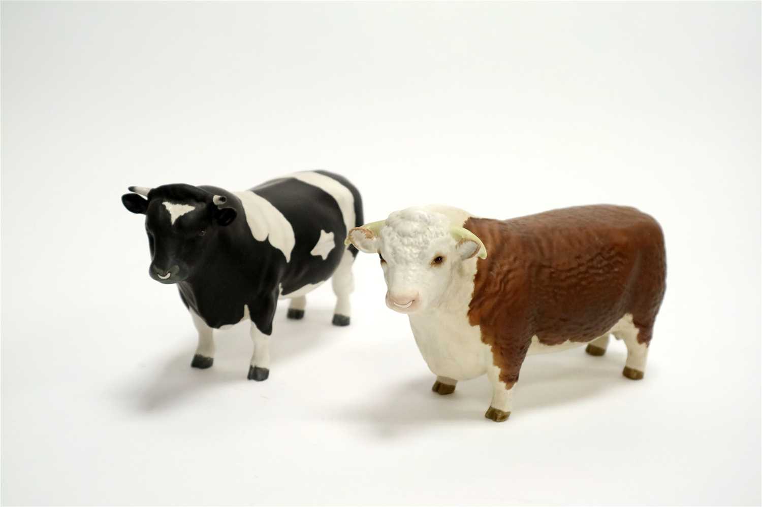 Lot 508 - Two Beswick models of cows