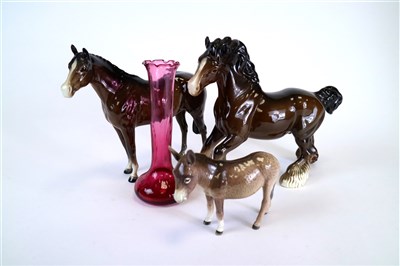 Lot 296 - A group of Beswick animals and cranberry glass