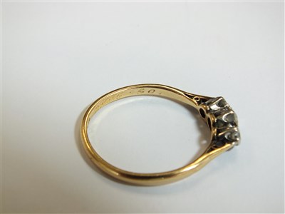 Lot 27 - A three stone diamond ring