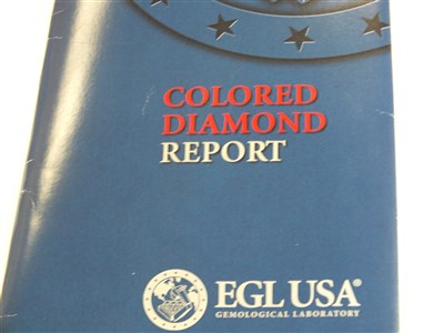Lot 302 - A fancy coloured diamond ring