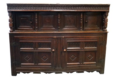 Lot 245 - A large 17th century and later country oak court cupboard
