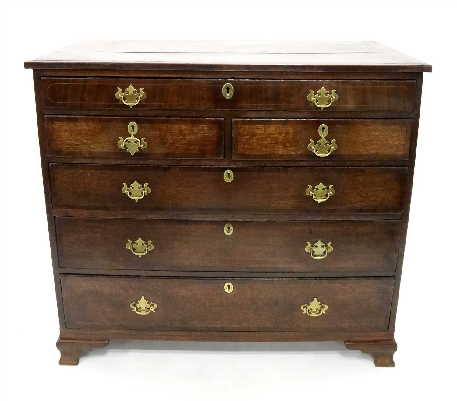 Lot 221 - An early 19th century country oak chest of drawers