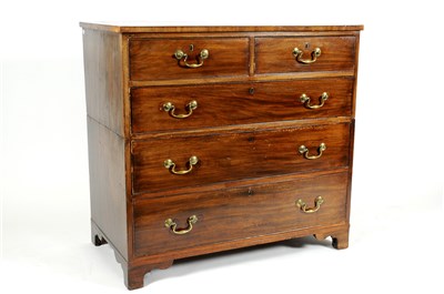 Lot 771 - A George III mahogany two-sectional cross-banded chest of drawers