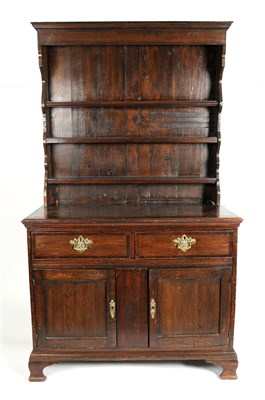 Lot 317 - A small 19th century country oak dresser with an associated wall / delft rack