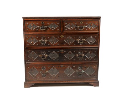 Lot 310 - A later carved George III country oak chest of drawers