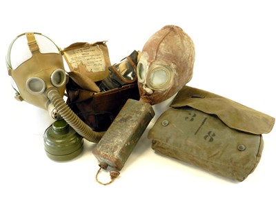 Lot 515 - German gas mask, WW2 ARP respirator, green canvas satchel and WWI Field Pouch