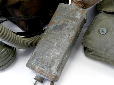 Lot 515 - German gas mask, WW2 ARP respirator, green canvas satchel and WWI Field Pouch
