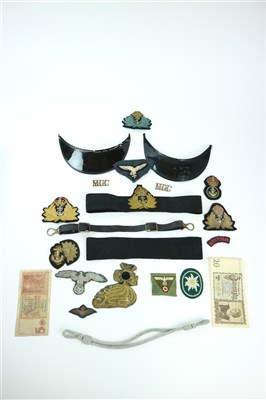 Lot 462 - A small and varied selection of cloth insignia...