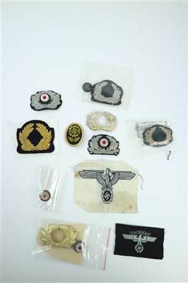 Lot 361 - An assorted collection of German Third Reich insignia