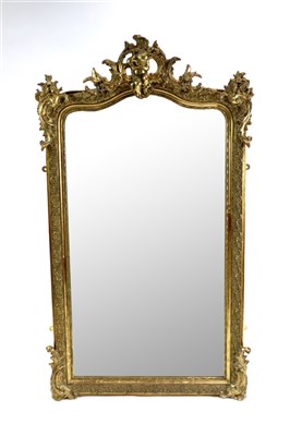 Lot 562 - A large French gilt framed wall mirror