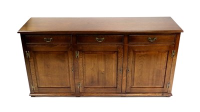 Lot 821 - A reproduction oak sideboard