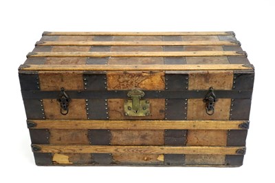 Lot 644 - An Edwardian bound pine travelling trunk