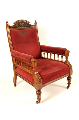 Lot 414 - A large Victorian oak framed upholstered armchair