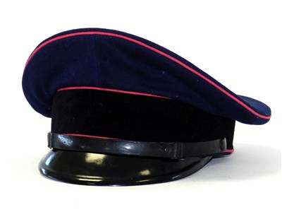 Lot 572 - A German Third Reich Fire Police visor cap – lacking insignia