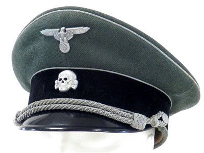 Lot 550 - A reproduction SS Officer's visor cap