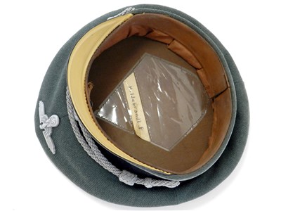 Lot 550 - A reproduction SS Officer's visor cap