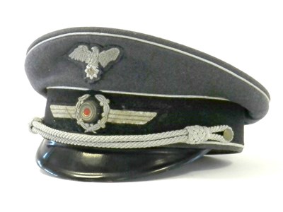 Lot 551 - A scarce Third Reich RLB (Reichsluftschutzbund) visor cap