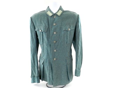 Lot 563 - A German Third Reich Schutzpolizei NCO's field blouse