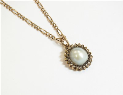 Lot 4 - A pearl and diamond cluster pendant