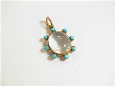 Lot 10 - A 19th century turquoise and rock crystal locket pendant