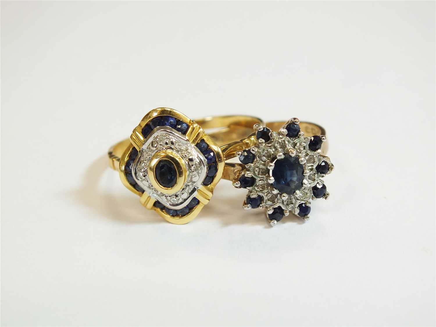 Lot 13 - Two sapphire and diamond rings