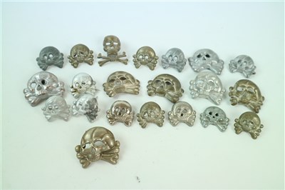 Lot 581 - Twenty one post-war SS-style skull badges