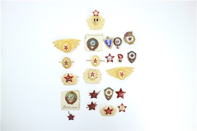 Lot 583 - Soviet Union bloc enamel cap badges and breast awards