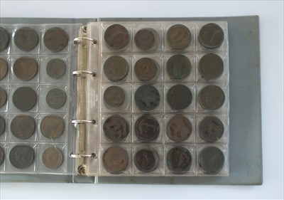 Lot 217 - An album of coins and tokens