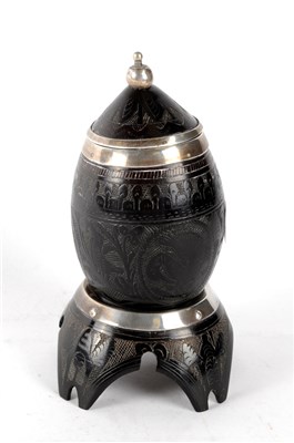 Lot 257 - A 19th century Indo-Portugese lidded coconut cup on stand