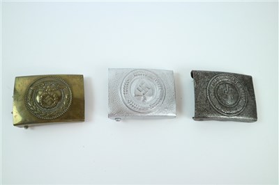 Lot 606 - Three assorted German buckles