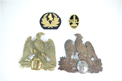 Lot 608 - Two 19th century French military helmet plates, Northern Lighthouse badge and a cap wreath