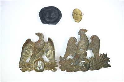 Lot 608 - Two 19th century French military helmet plates, Northern Lighthouse badge and a cap wreath