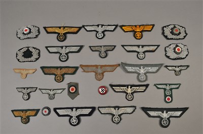 Lot 618 - Over 50 German Third Reich cloth badges - including reproduction