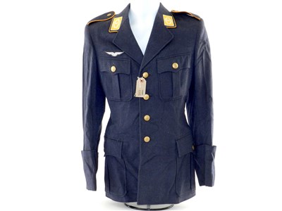 Lot 614 - Three military tunics